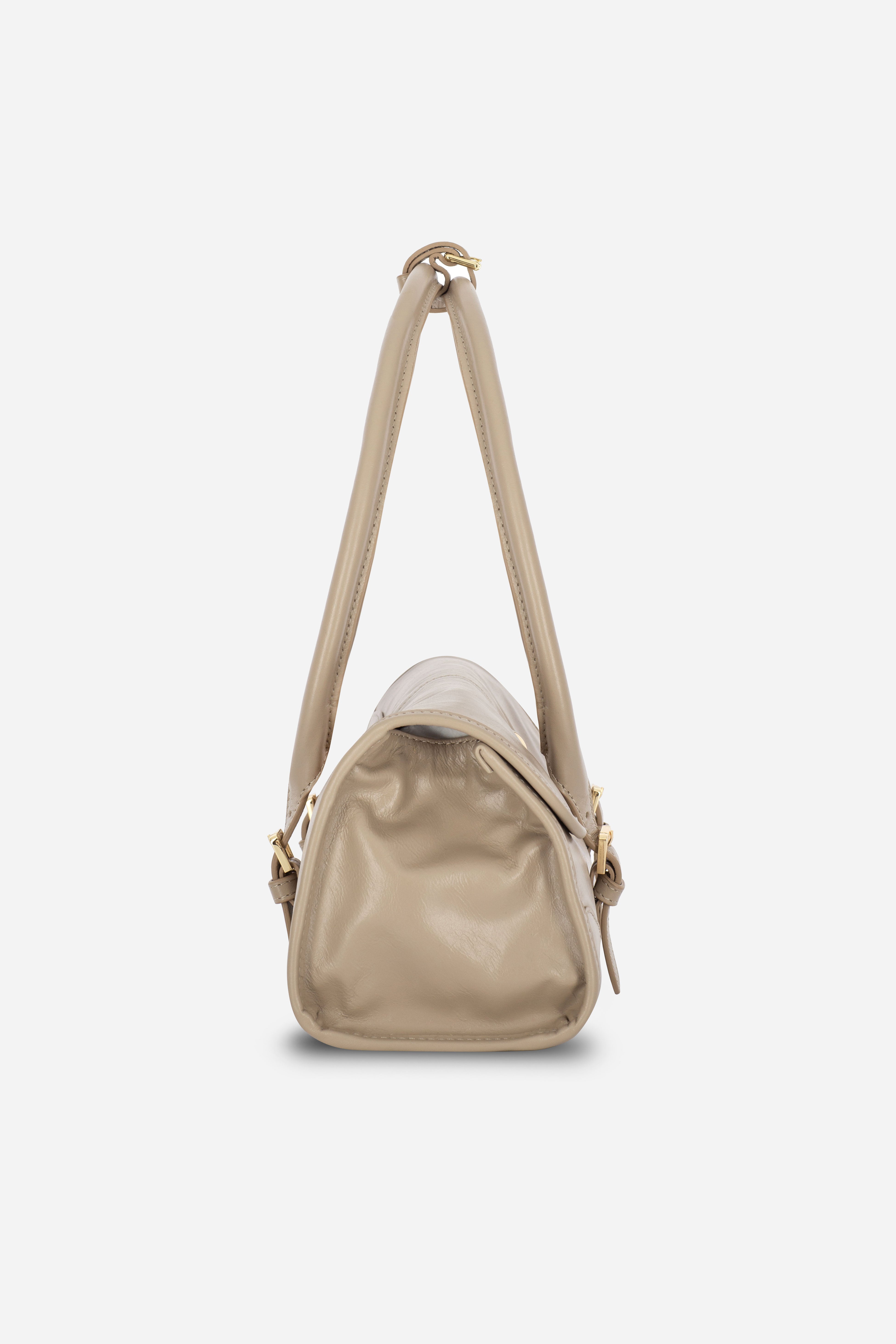 Rilu Amara sand leather shoulder bag side view showing depth
