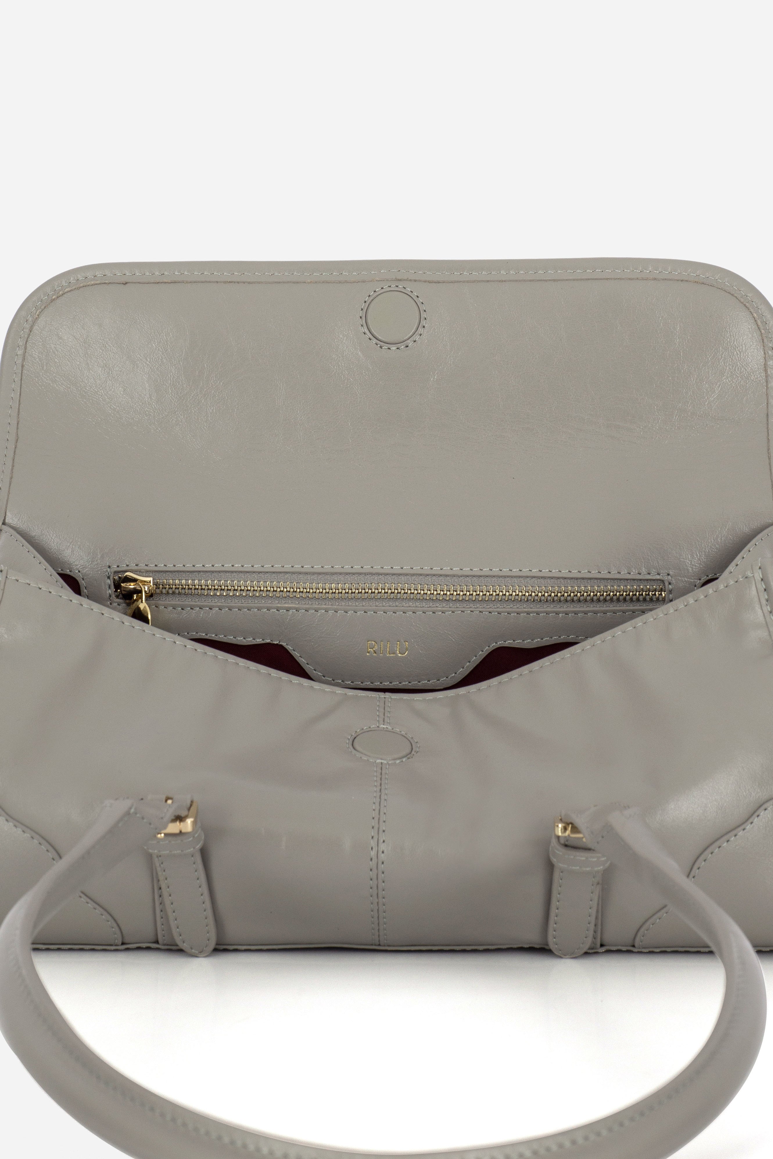Rilu Amara stone gray leather shoulder bag close-up of thoughtful detail