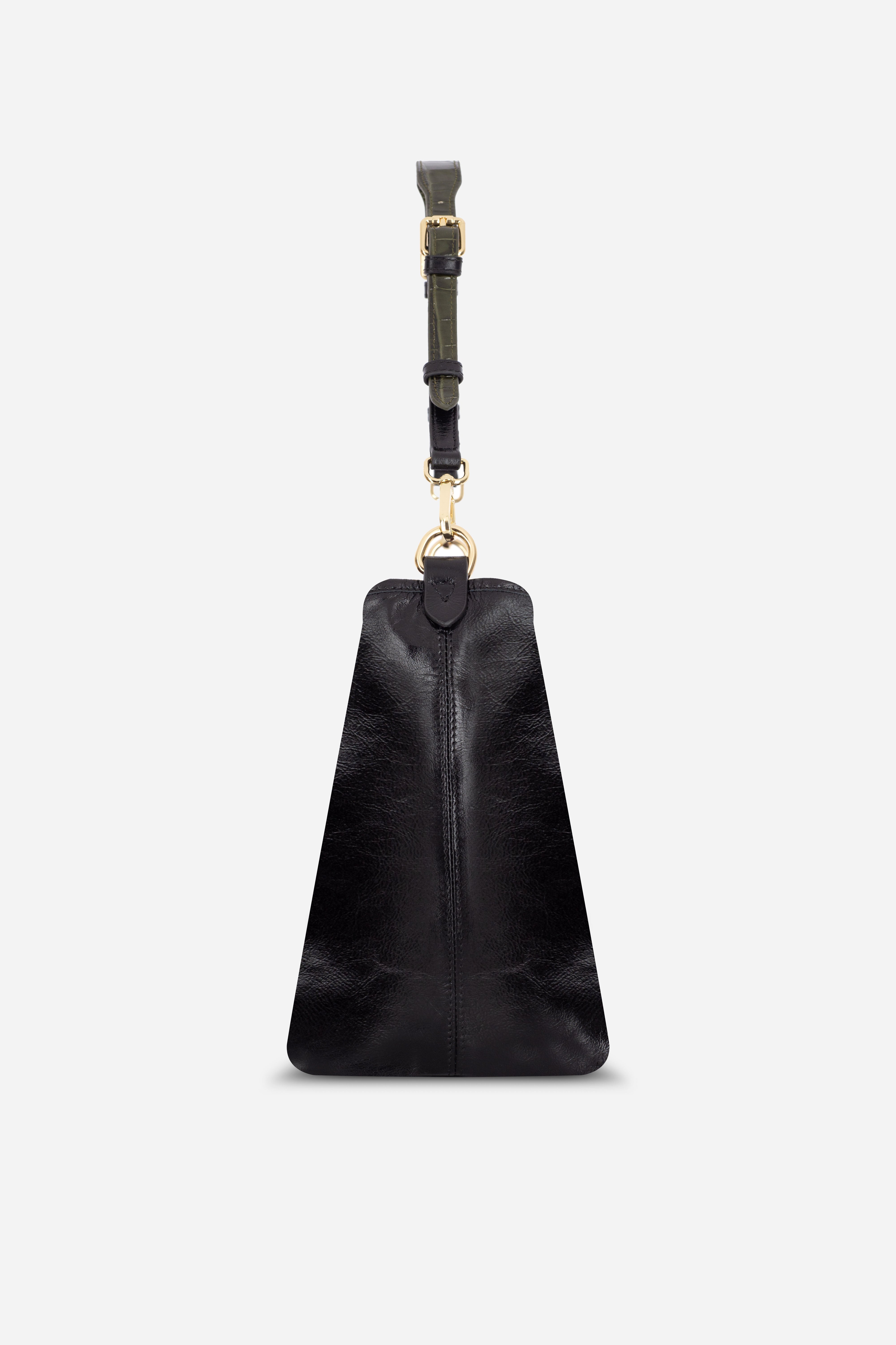 Rilu Elan black leather shoulder bag side view showing soft structure and drape