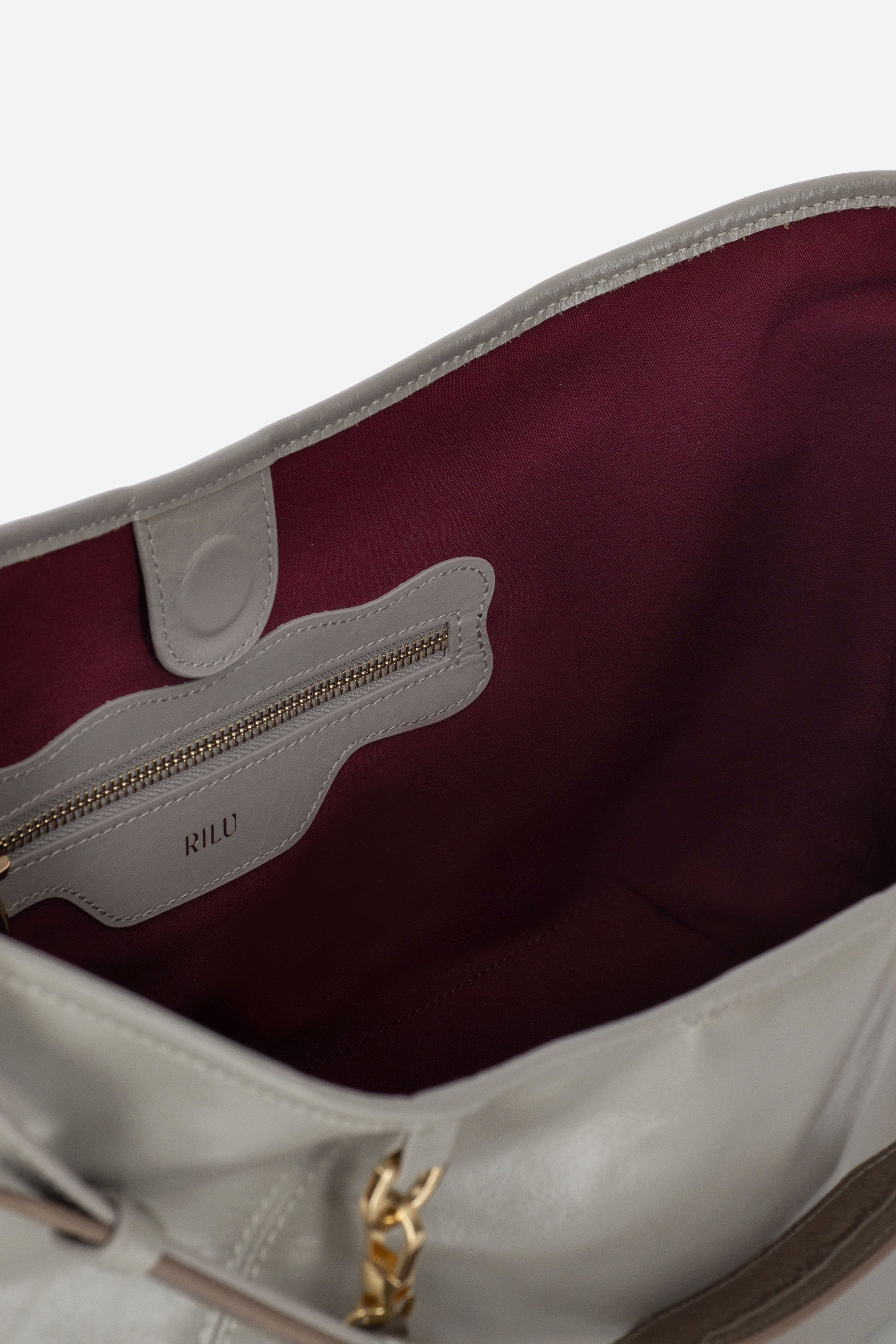 Rilu Elan stone gray leather shoulder bag close-up of soft leather texture