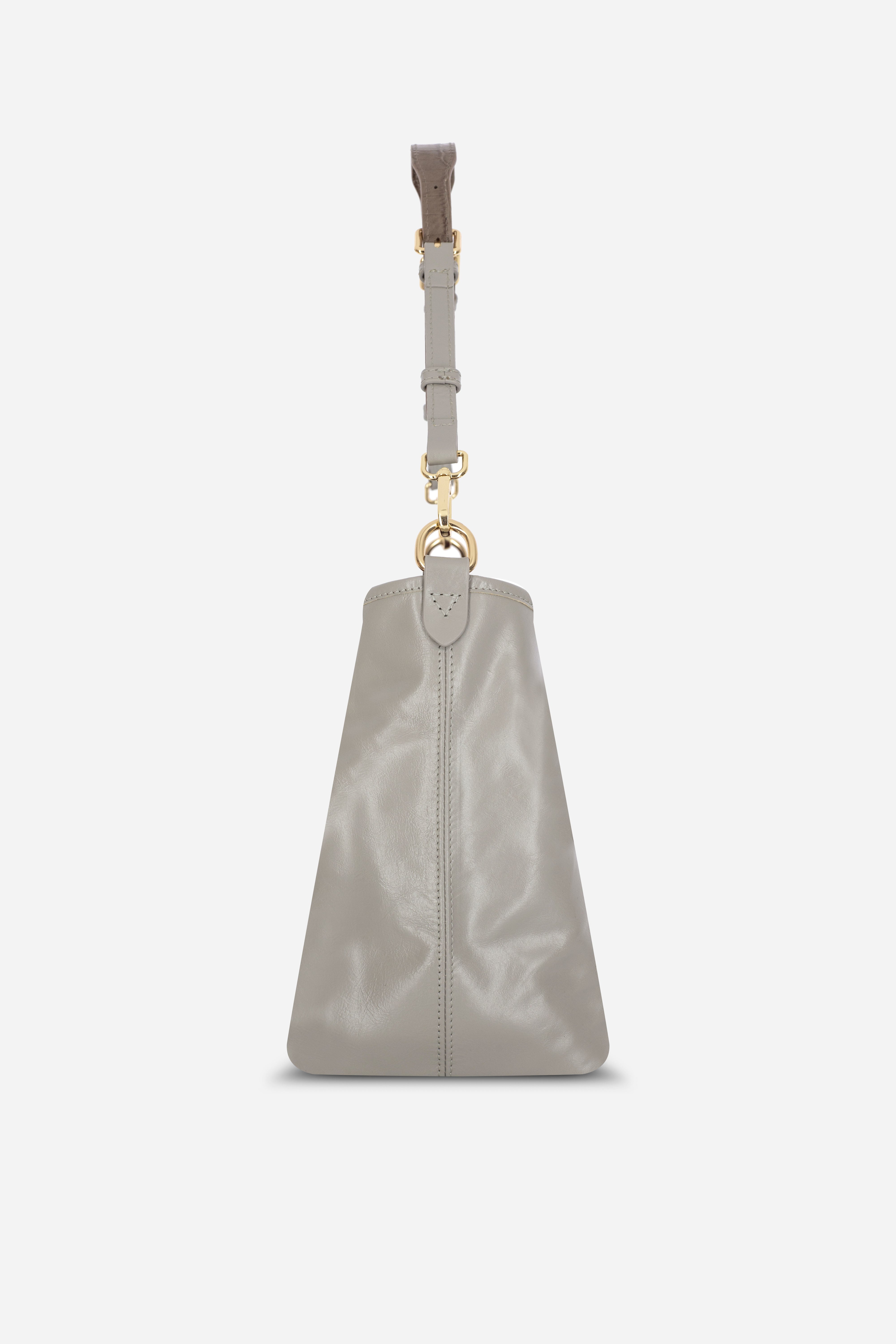 Rilu Elan stone gray leather shoulder bag side view showing soft structure