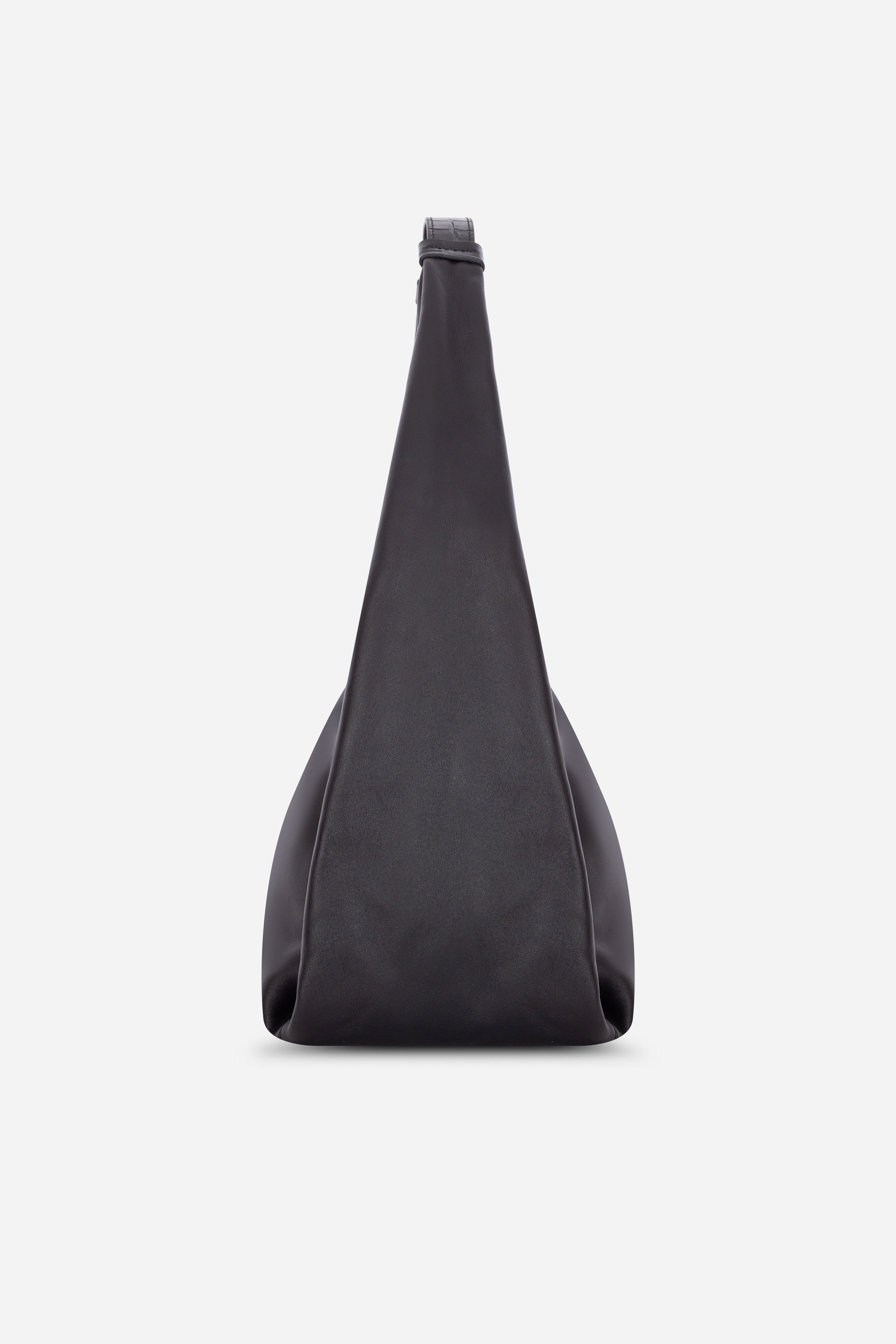Rilu Hera black leather hobo bag side view showing relaxed drape and volume
