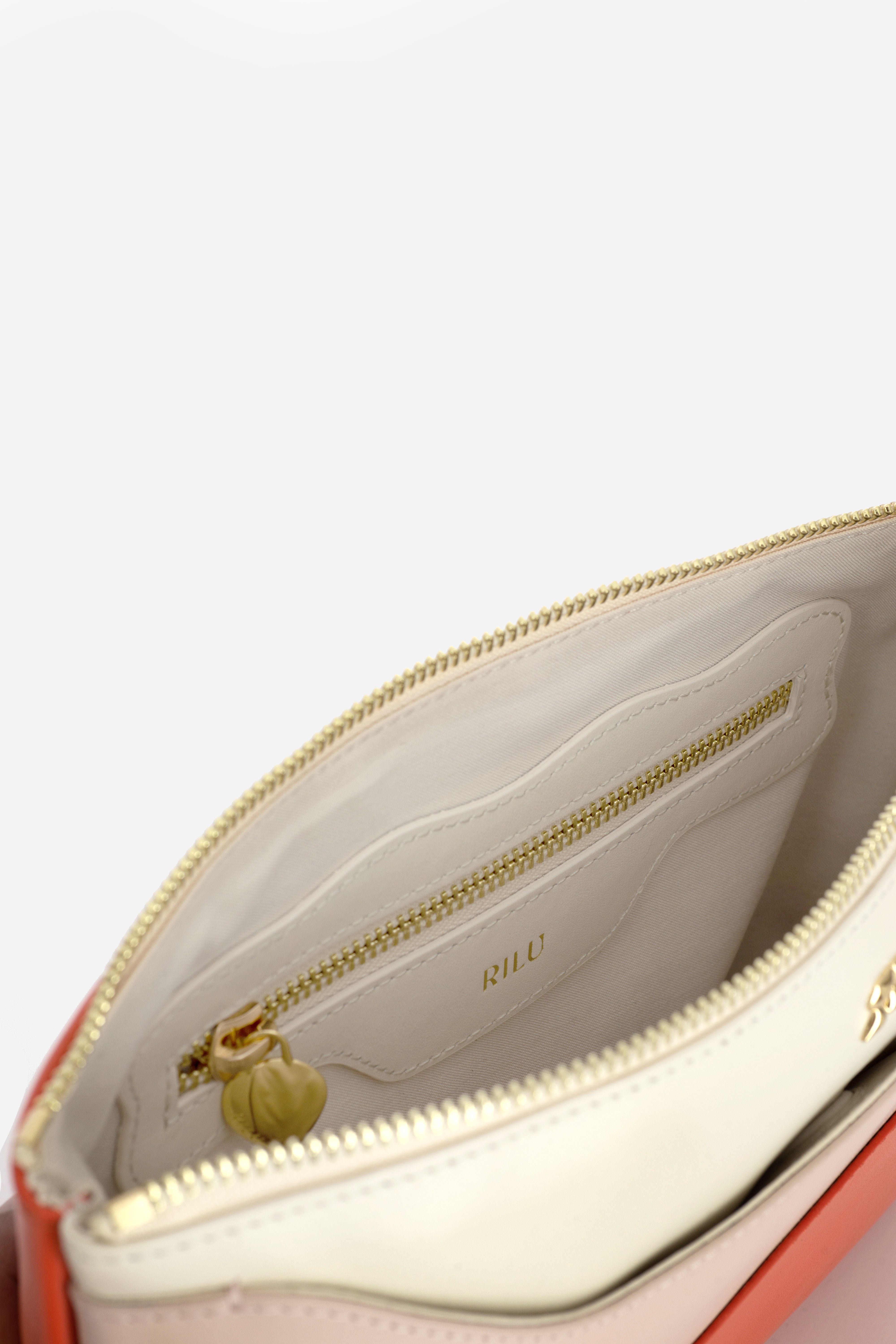 Rilu Ivy leather clutch close-up of the salmon croco print and ivory texture