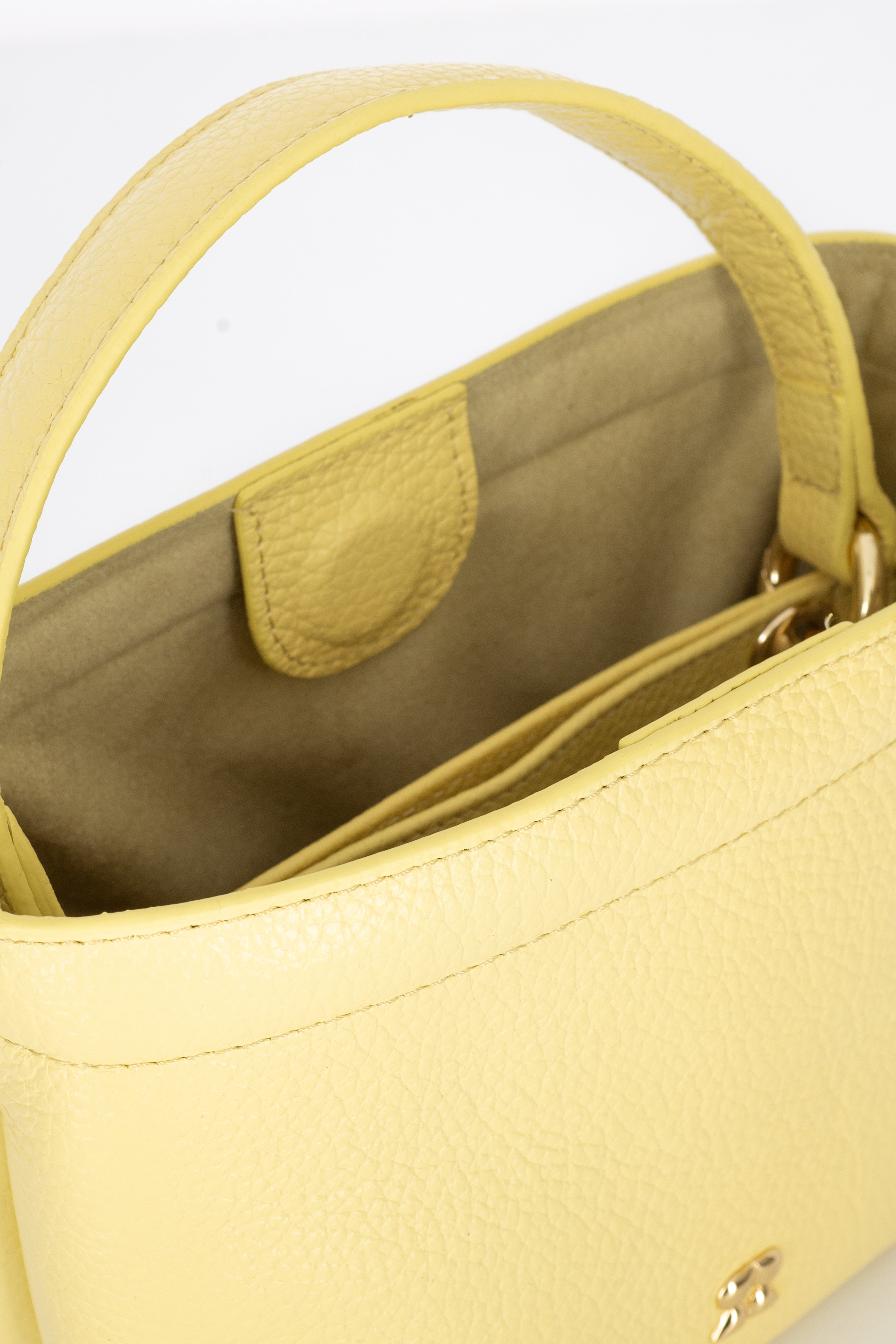 Rilu LouLou studded butter yellow leather bag close-up of studs and detail