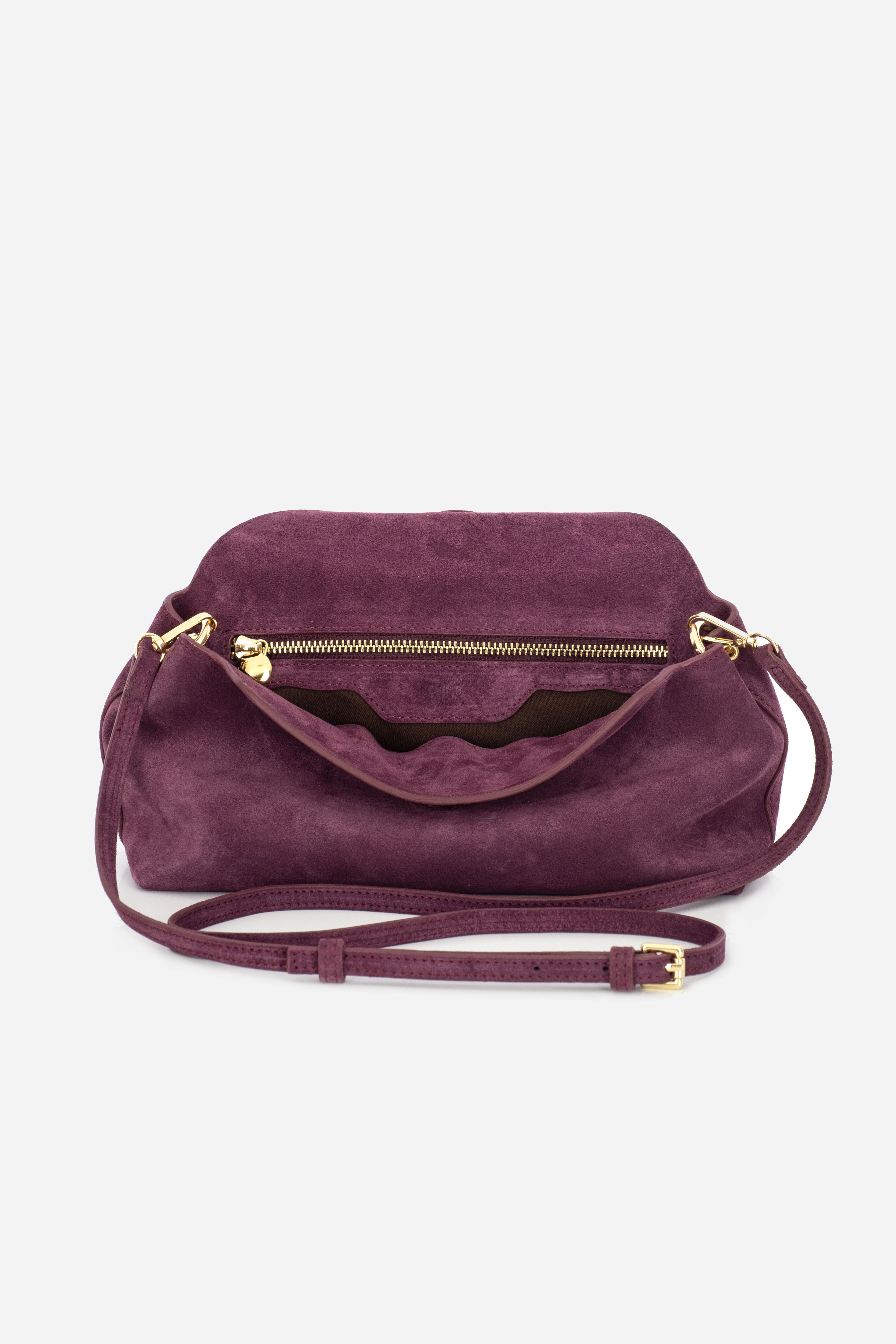 Rilu Rhea berry suede leather clutch close-up of luxurious suede material