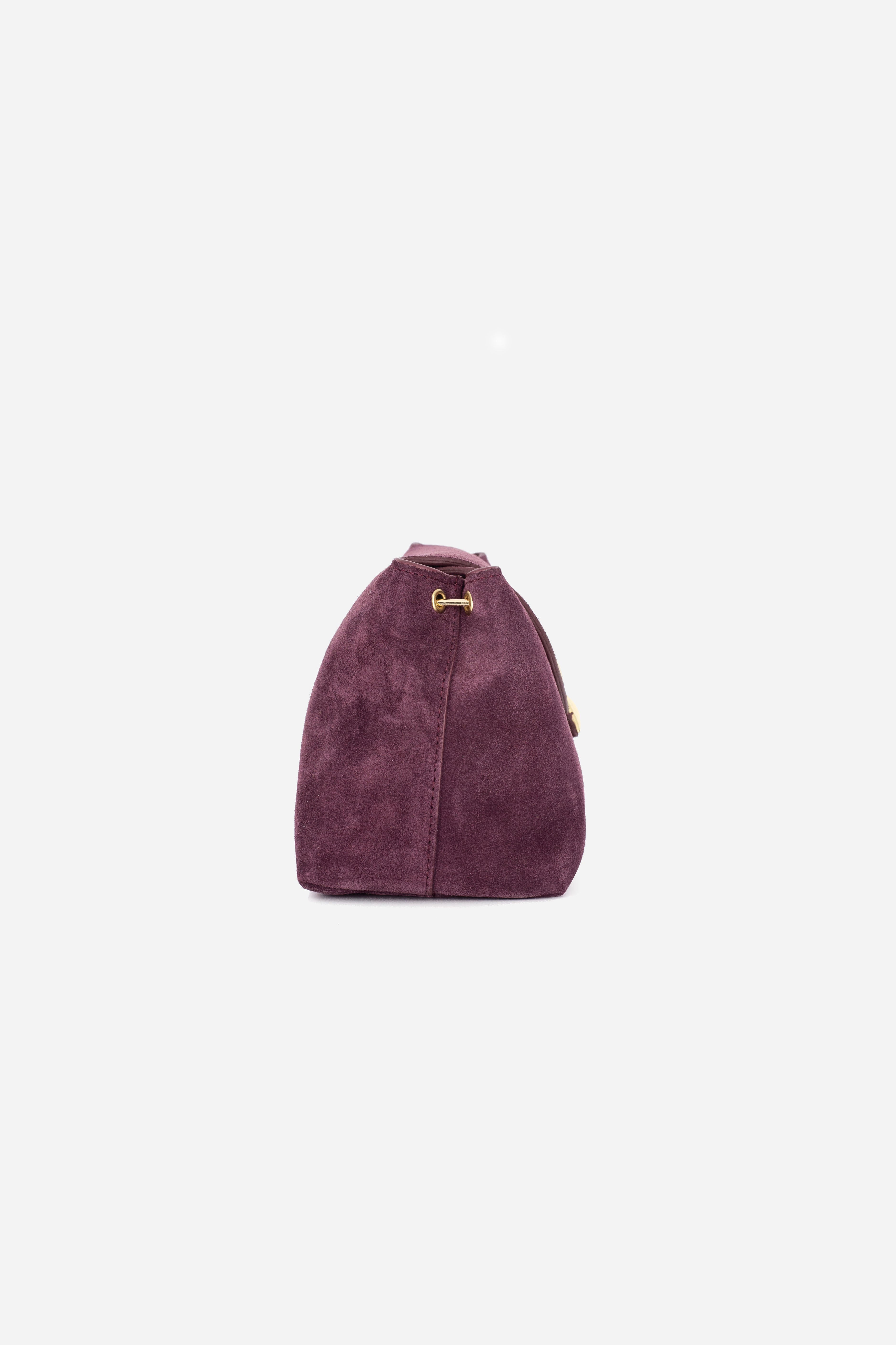 Rilu Rhea berry suede leather clutch side view worn with removable chain strap