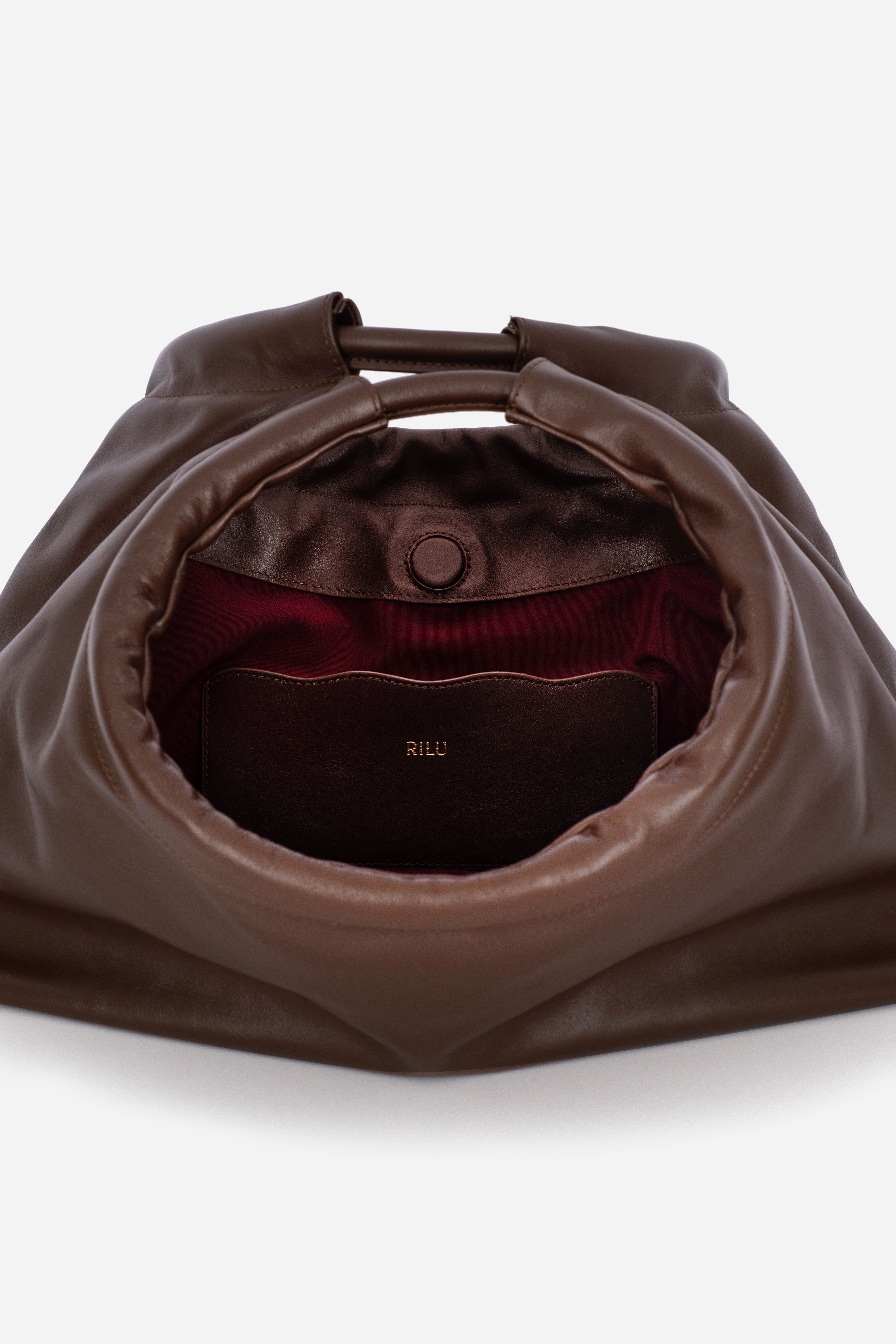 Rilu Sirena espresso leather shoulder bag close-up of ruched detail
