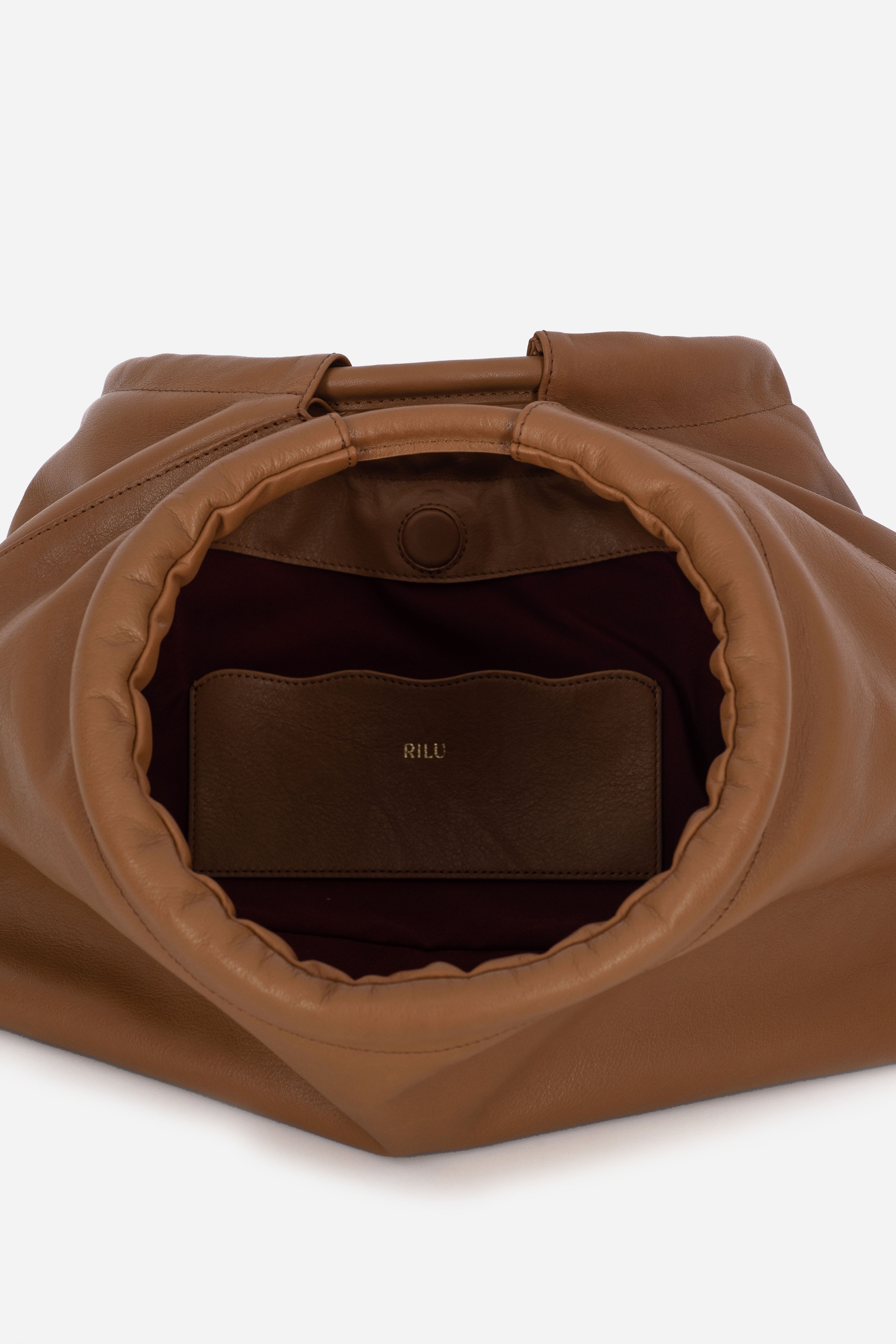 Rilu Sirena toffee leather shoulder bag close-up of ruched detail and soft leather
