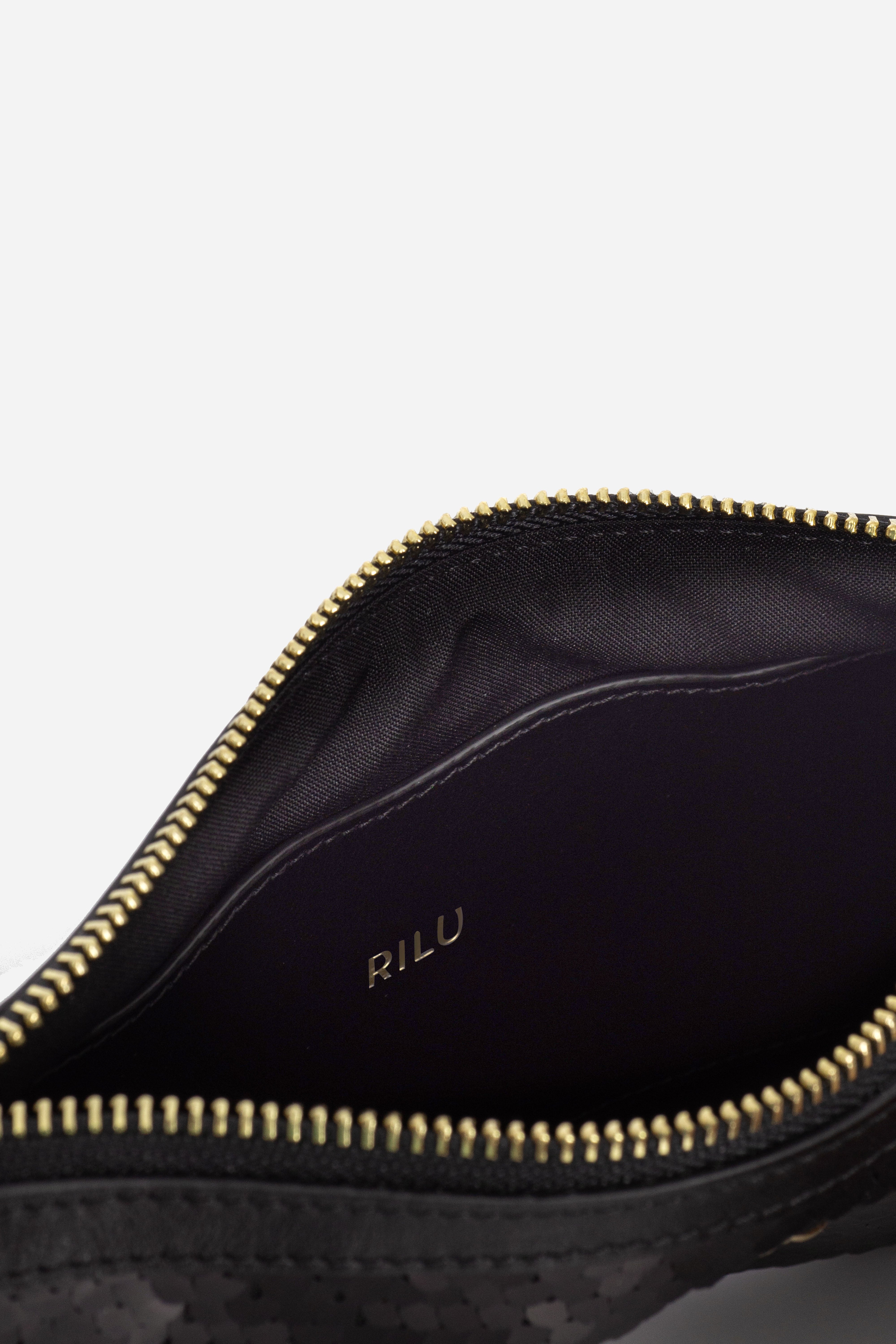 Rilu Kaia black clutch close-up of sequin material and texture