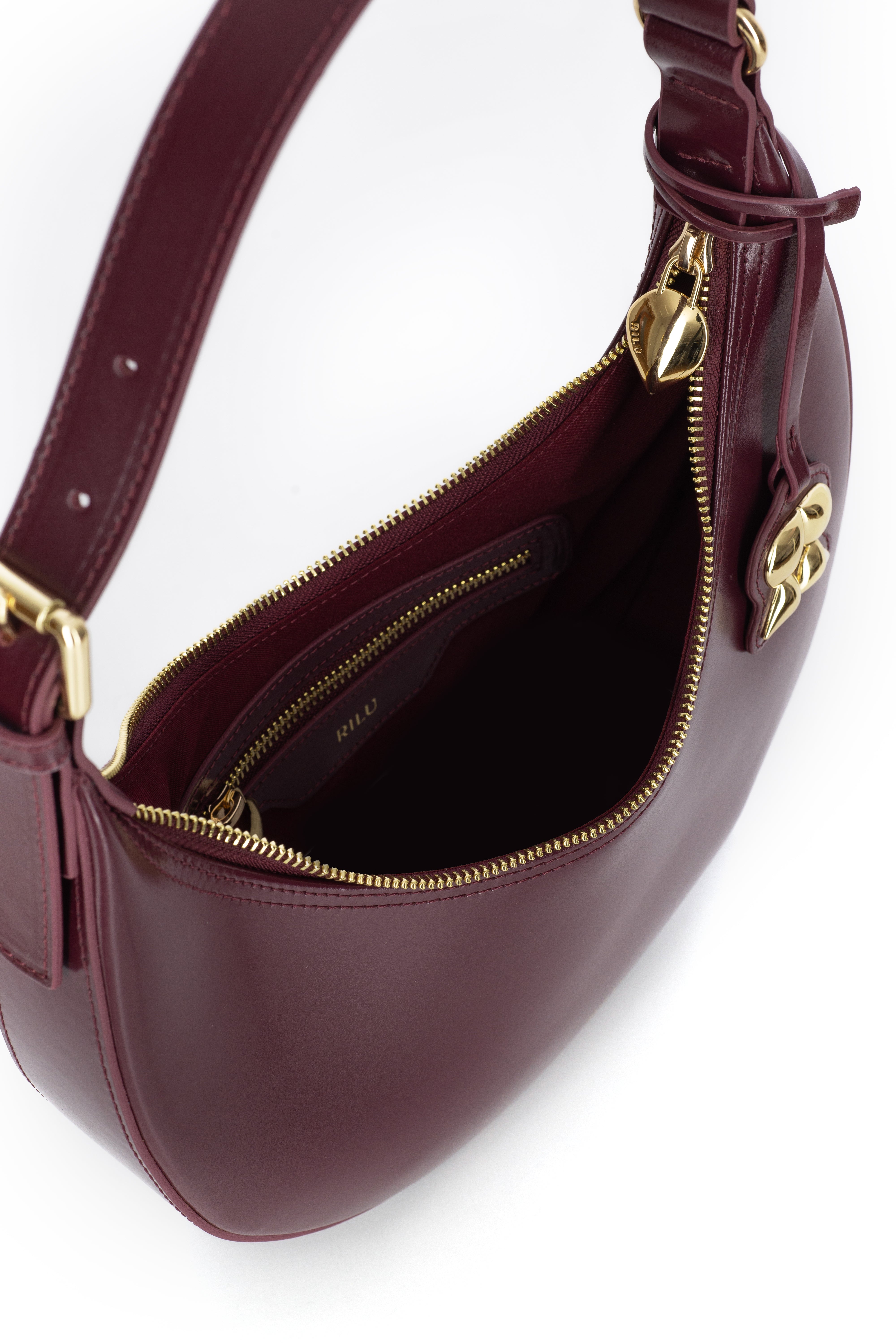 Rilu Luna burgundy leather shoulder bag close-up of zipped closure and leather