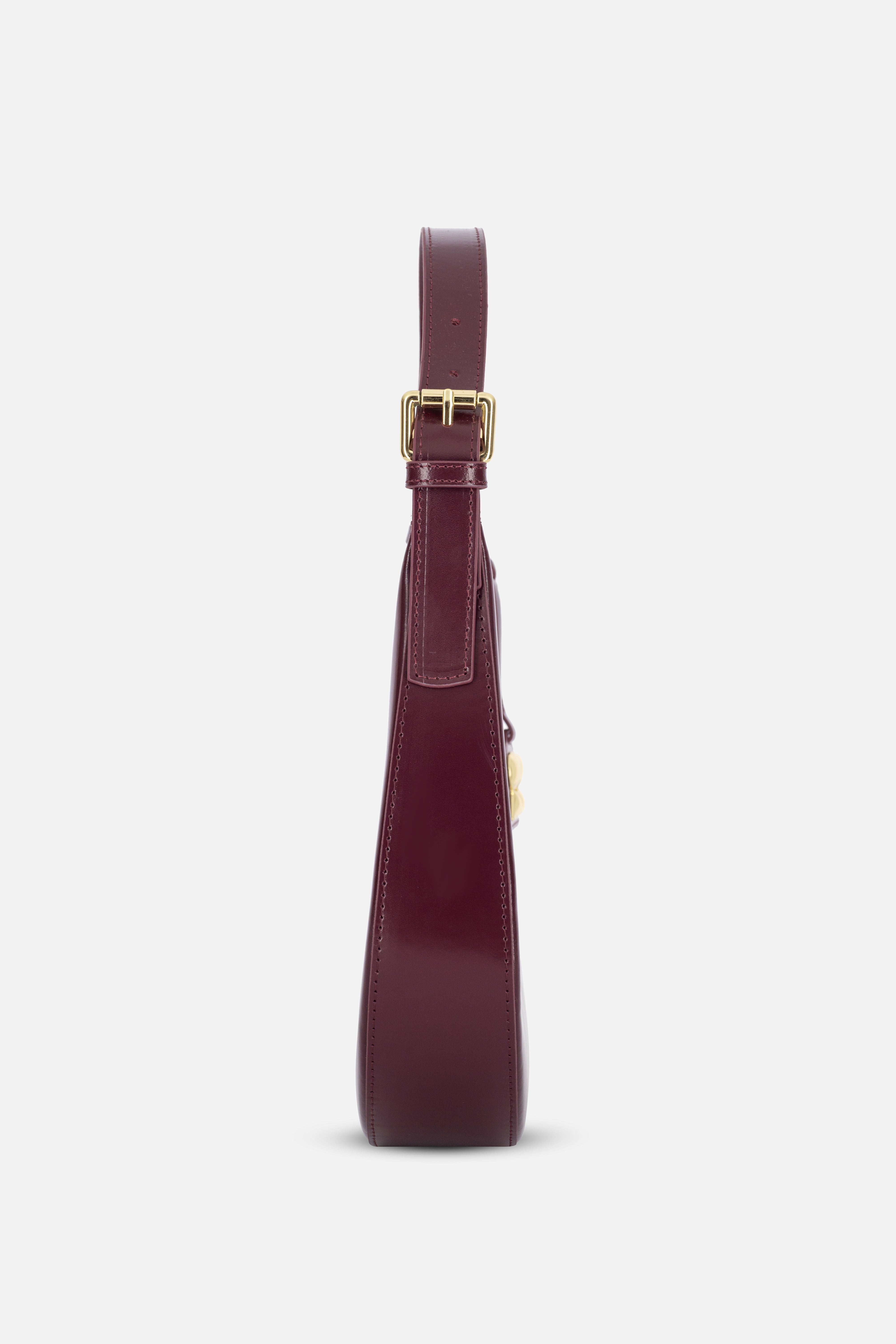 Rilu Luna burgundy leather shoulder bag side profile showing smooth curve
