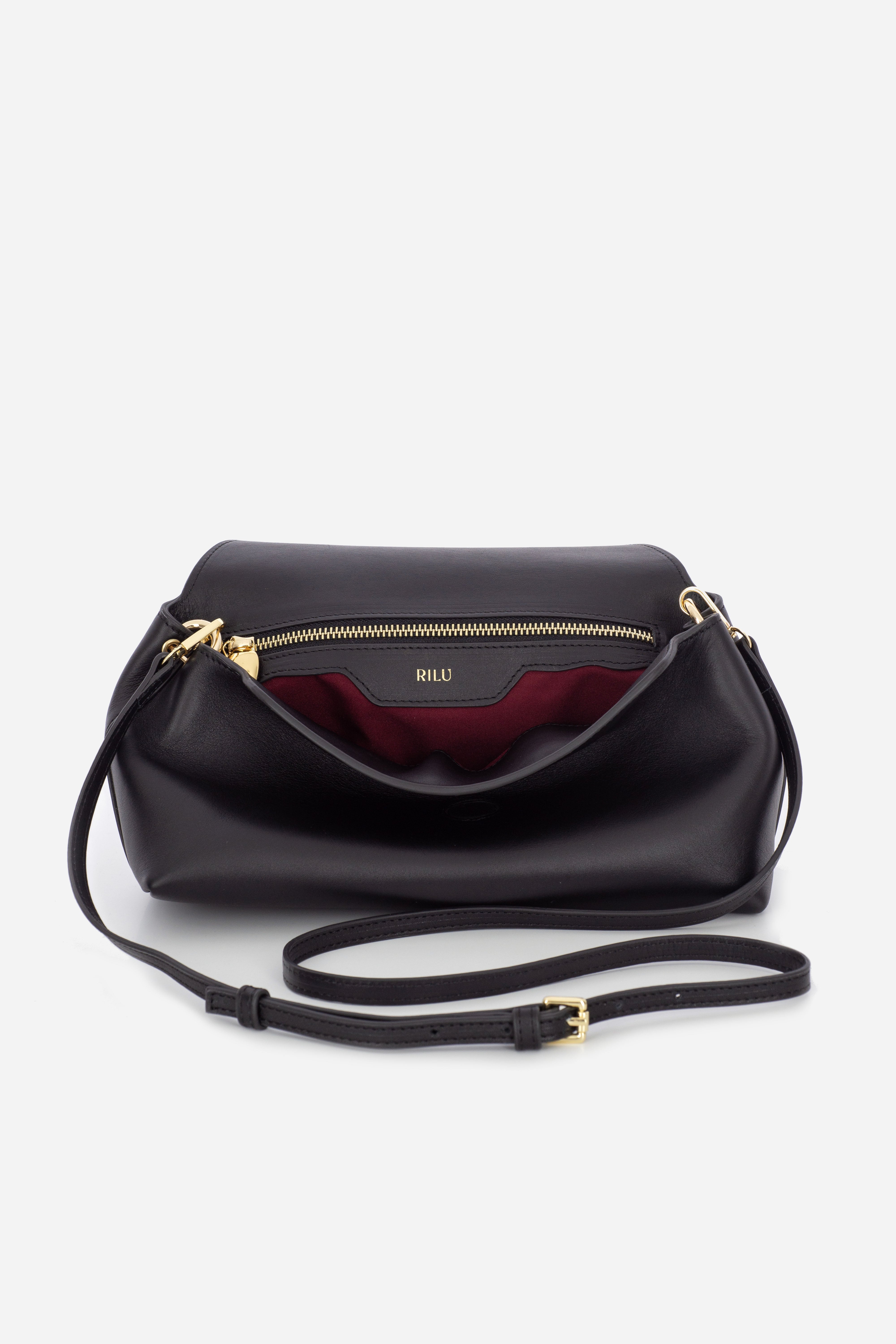 Rilu Rhea black leather clutch close-up of smooth leather texture