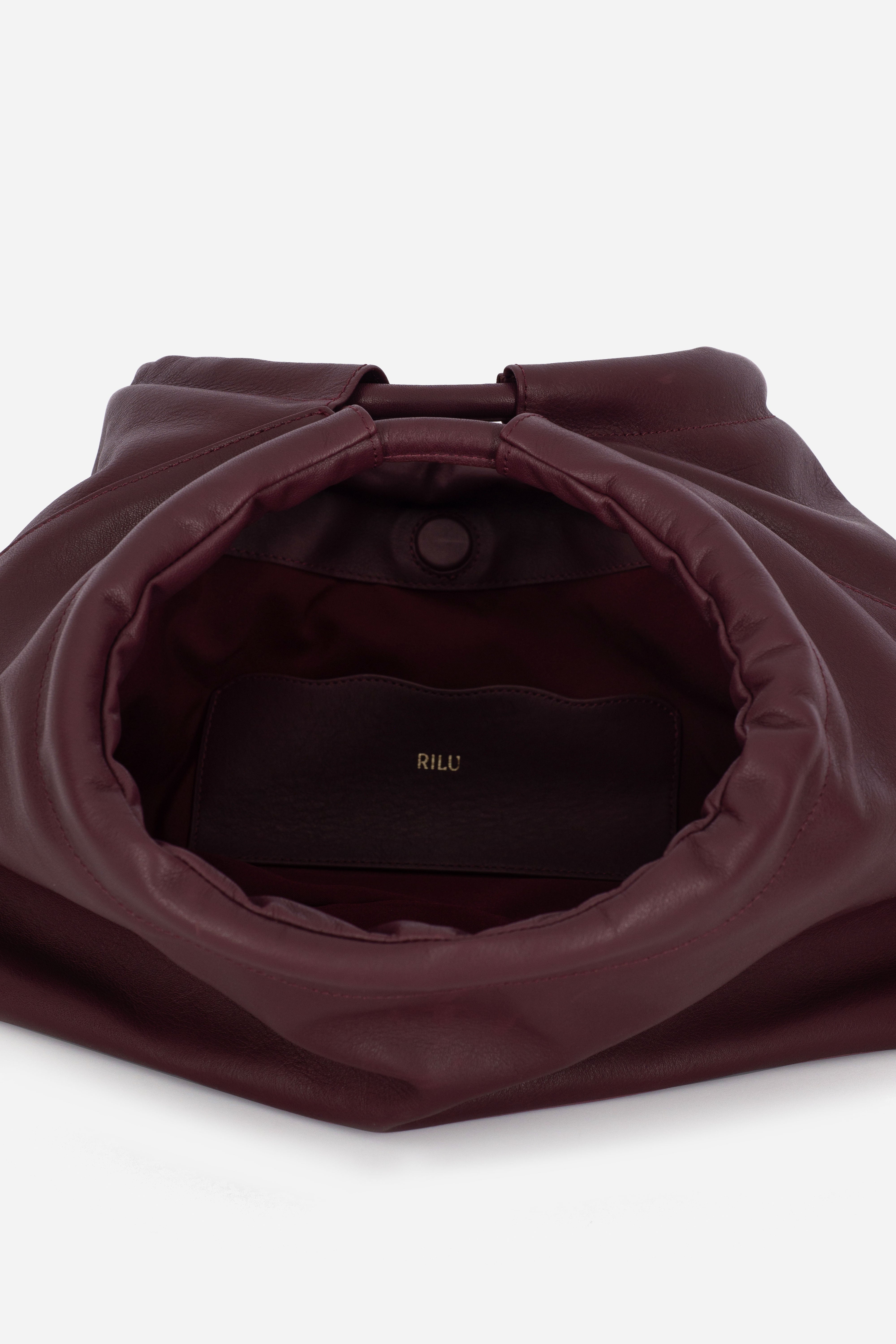 Rilu Sirena burgundy leather shoulder bag close-up of ruched detail